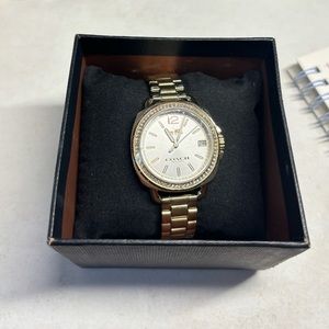 W Coach gold SS watch